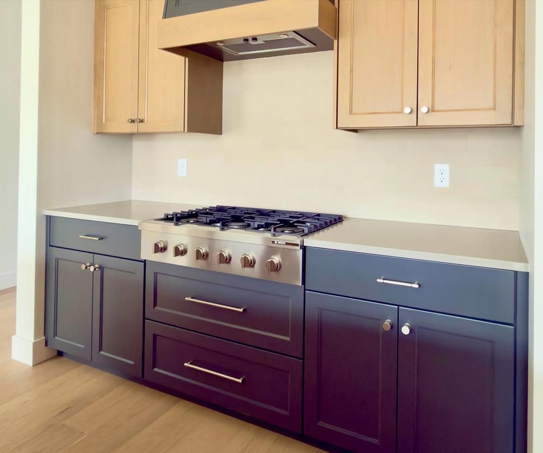 Navy kitchen with range wall Naples