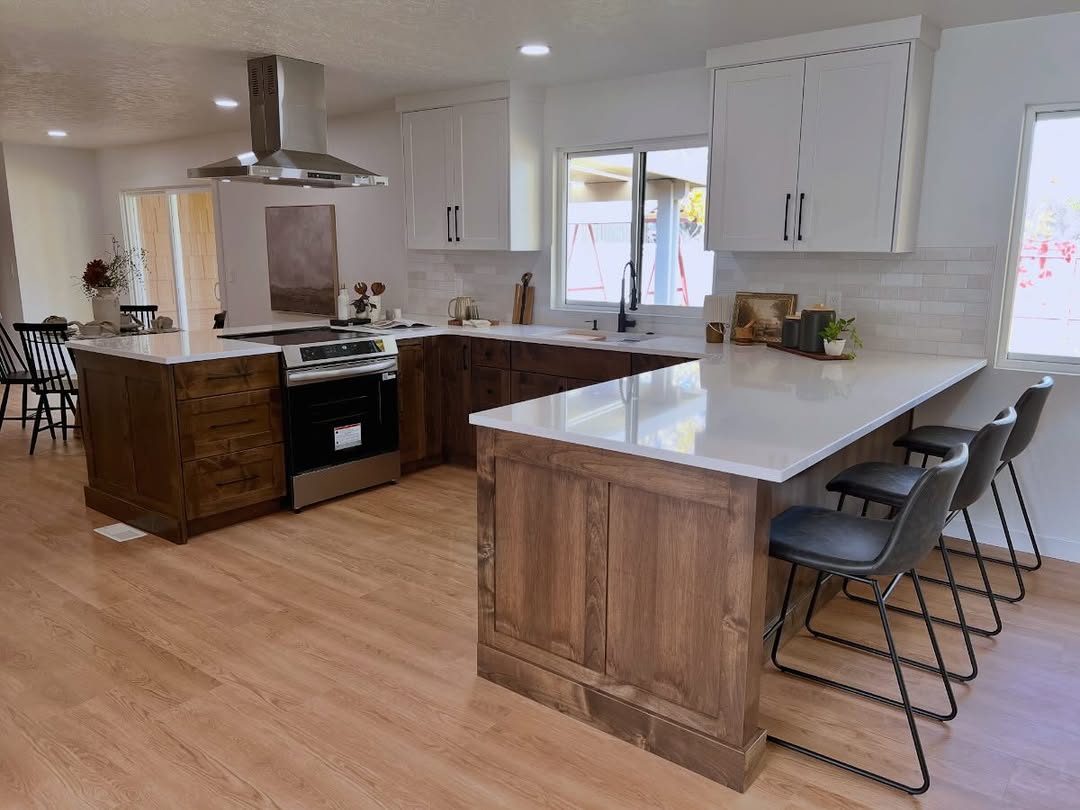 White kitchen with island seating