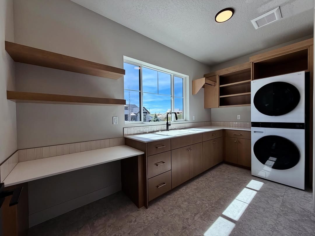 Custom laundry room with folding station